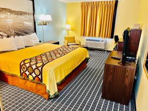 Letto o letti in una camera di Super 8 by Wyndham Red Wing