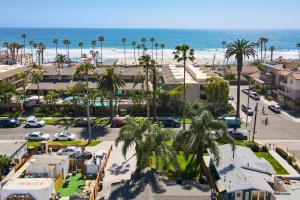 an aerial view of a parking lot and the beach at Oceanside Rocks Family Vacation Home in Oceanside