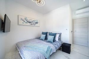 Posteľ alebo postele v izbe v ubytovaní Apartment Vin - sea promenade