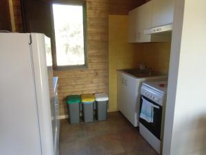 Η κουζίνα ή μικρή κουζίνα στο Holiday home Stella di Sicilia