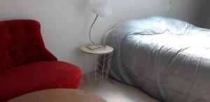 Posteľ alebo postele v izbe v ubytovaní Triplex tout confort, plein centre ville Bauge en Anjou + 3 fotografie