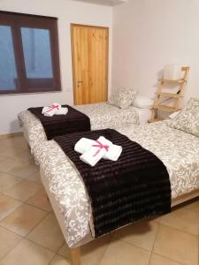 Ένα ή περισσότερα κρεβάτια σε δωμάτιο στο CASA RUGALL