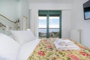 Posteľ alebo postele v izbe v ubytovaní Endless Blue Villa Lefkada