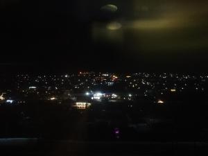 a view of a city at night with lights at Belas guesthouse in Stepantsminda