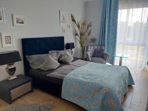 Postel nebo postele na pokoji v ubytování Apartament Blue Sky