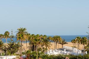 a view of the beach from the resort at Trendy, very well located apartment in Playa del Ingles