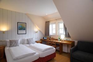 Postel nebo postele na pokoji v ubytování Hotel Zum Harzer + 37 fotografií