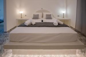 Giường trong phòng chung tại The F Suites