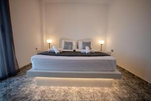 Giường trong phòng chung tại The F Suites