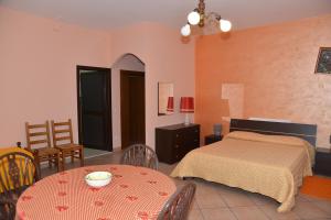 Ένα ή περισσότερα κρεβάτια σε δωμάτιο στο Villa Annette B&B