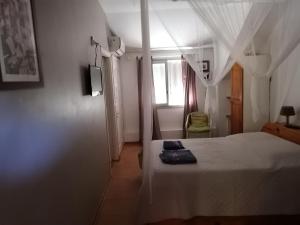 Letto o letti in una camera di SAS L' Ilot Vert