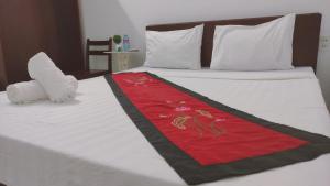 Postel nebo postele na pokoji v ubytování Mango Garden Hoi An Homestay