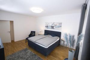 Łóżko lub łóżka w pokoju w obiekcie Stadtjuwel l BG10