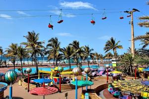 a amusement park with a bunch of slides and rides at Durban Point Waterfront, 805 Quayside 40 Canalquay Rd in Durban