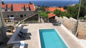 Utsikt över poolen vid Villa Bona Dubrovnik eller i närheten