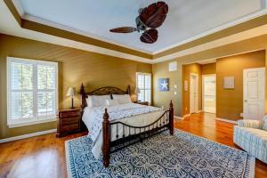 a bedroom with a bed and a ceiling fan at Grande at Canal Pointe 19375 Mersey Dr in Rehoboth Beach +52 photos
