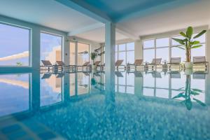 Bazén v ubytování Hotel In Excelsis nebo v jeho okolí