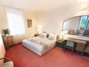 Cama o camas de una habitación en Hotel Lucija