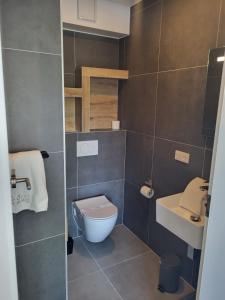 Um banheiro em Guesthaus 2