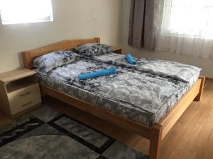 Ένα ή περισσότερα κρεβάτια σε δωμάτιο στο Apartman KONAK