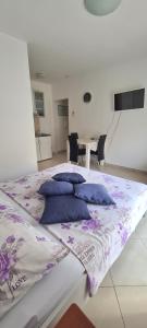 Ένα ή περισσότερα κρεβάτια σε δωμάτιο στο Apartman Scotti