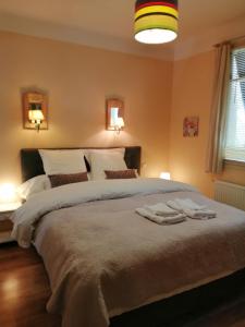 Katil atau katil-katil dalam bilik di La Mirabelle-casteil Country House