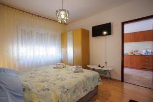 Posteľ alebo postele v izbe v ubytovaní Apartment studio close to sea