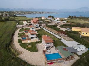 an aerial view of a house with a pool at CRYSTAL VILLAS in Lixouri