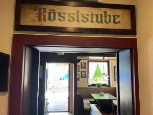 Certifikát, hodnocení, plakát nebo jiný dokument vystavený v ubytování Weisses Rössl am See
