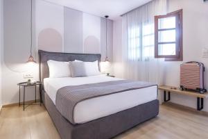 Posteľ alebo postele v izbe v ubytovaní 9 Luxury Rooms