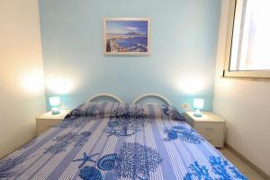 Кровать или кровати в номере VILLETTA A SCHIERA UNO vicino MALDIVE DEL SALENTO