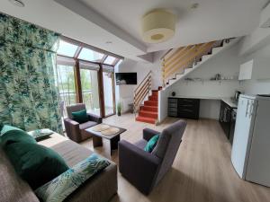 Kuchyňa alebo kuchynka v ubytovaní Apartament Perła A31