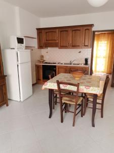 Кухня или мини-кухня в Appartamento per vacanza
