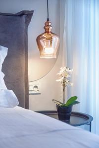 Posteľ alebo postele v izbe v ubytovaní 9 Luxury Rooms