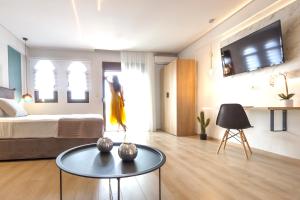 Posteľ alebo postele v izbe v ubytovaní 9 Luxury Rooms