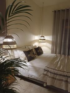 Ліжко або ліжка в номері Petra Lodge