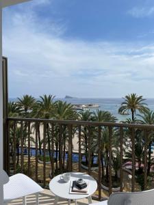 a view of the beach from the balcony of a resort at Casual Pop Art Benidorm in Benidorm