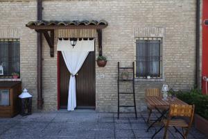 A patio or other outdoor area at Appartamenti il PALAZZACCIO