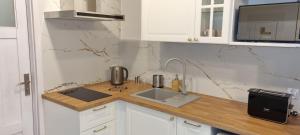 Kuchyňa alebo kuchynka v ubytovaní Nowe Apartamenty na Gryfa