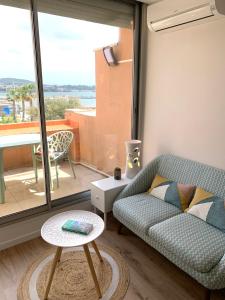 Posezení v ubytování Élégant appartement T2 en 1ère ligne de l'Étang de Thau avec terrasse - Cures et vacances