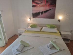 Postel nebo postele na pokoji v ubytování Apartment Rita