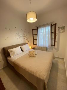 A bed or beds in a room at On the road house