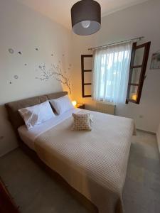 A bed or beds in a room at On the road house