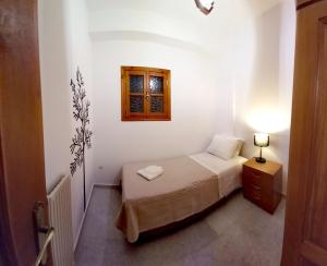 A bed or beds in a room at On the road house