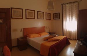 Postel nebo postele na pokoji v ubytování B&B Borgomarino