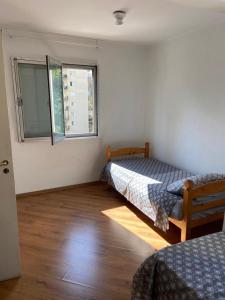 Кровать или кровати в номере Apartamento Giovanni Gronchi