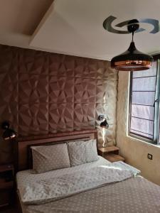 Ένα ή περισσότερα κρεβάτια σε δωμάτιο στο GRANDE SPA DELUXe STUDIOS +72 φωτογραφίες