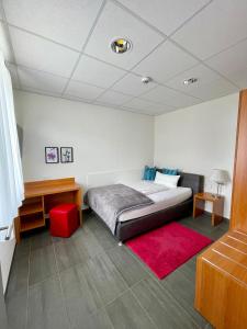 Кровать или кровати в номере Hotel Burgholz