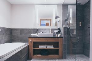 Koupelna v ubytování PUR Suites & Chalets