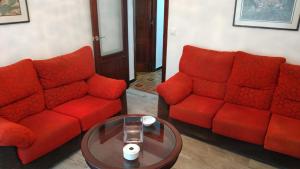 Posedenie v ubytovaní Piso en centro urbano de Puentedeume con terraza